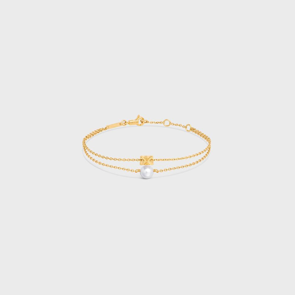 CELINE Women Les Perles Celine Bracelet in Resin Pearl and Brass with Gold Finish GOLD / IVORY 461HA6PRB.01GI