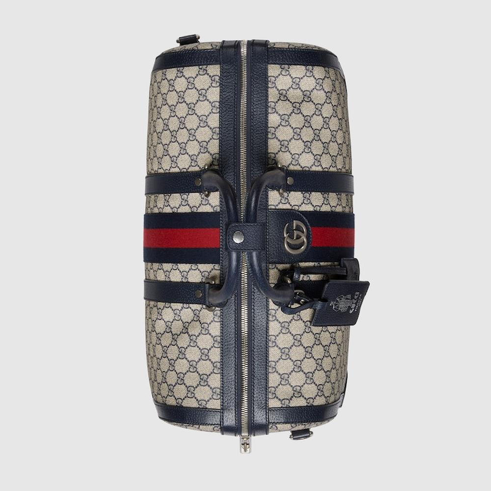 GUCCI Men Gucci Savoy medium duffle bag Beige and blue GG Supreme canvas 724642 9C2SN 4076