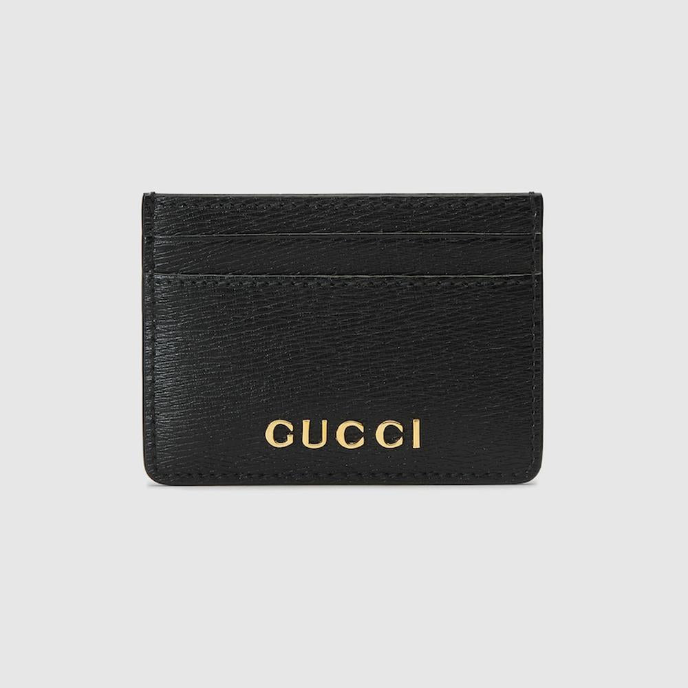 محفظة بطاقات GUCCI للرجال من الجلد الأسود بخط Gucci 773428 0OP0N 1000