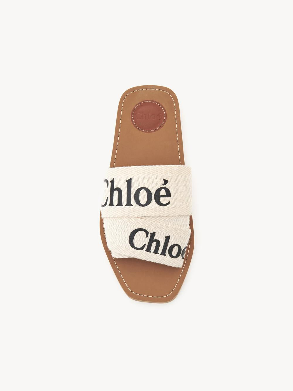 حذاء نسائي من CHLOE Woody Mules باللون الأبيض CHC22U188Z3101